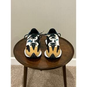 New Balance 270 Sneakers in Navy, White, and Tan